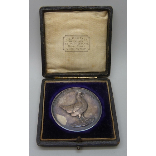 7298 - A Victorian silver medallion, The Minorca Club, For Best Hen in London Minorca Club Show 1895, cased