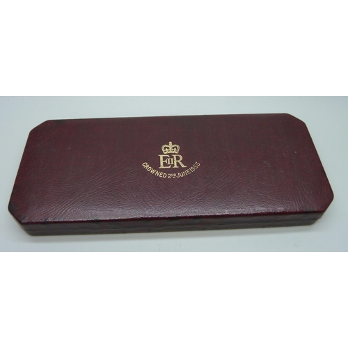 7302 - A Royal Mint Queen Elizabeth Coronation coin set, cased