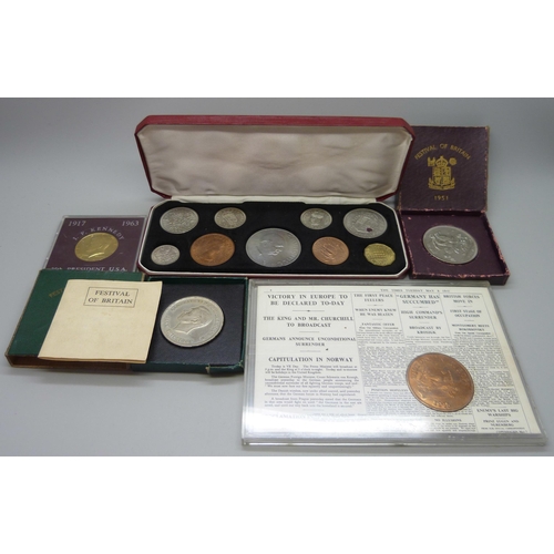 7305 - A 1965 Churchill coin set, a Victory in Europe coin, a J.F. Kennedy coin and two Festival of Britain... 