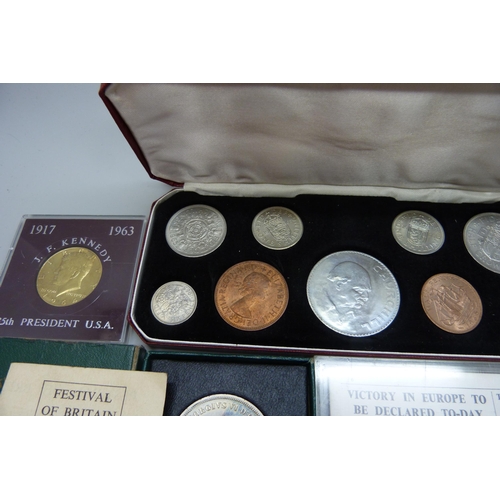 7305 - A 1965 Churchill coin set, a Victory in Europe coin, a J.F. Kennedy coin and two Festival of Britain... 