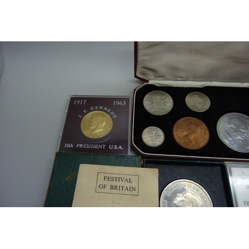 7305 - A 1965 Churchill coin set, a Victory in Europe coin, a J.F. Kennedy coin and two Festival of Britain... 