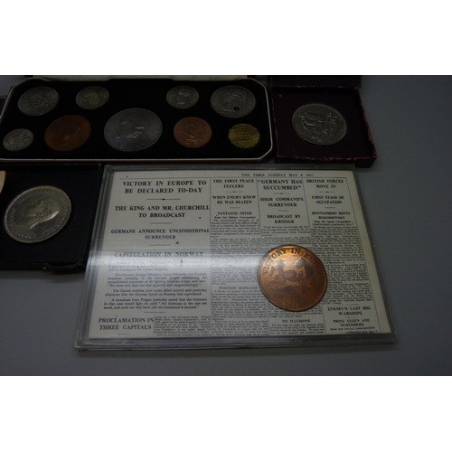 7305 - A 1965 Churchill coin set, a Victory in Europe coin, a J.F. Kennedy coin and two Festival of Britain... 