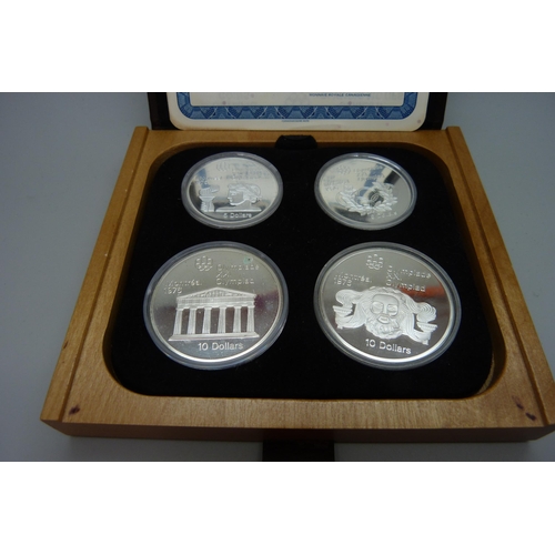 7308 - A set of Canadian Mint sterling silver proof 1976 Olympics coins, cased and with certificate