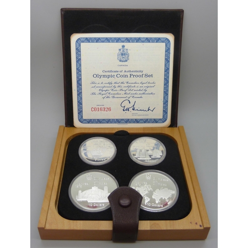 7309 - A set of Canadian Mint sterling silver proof 1976 Olympic coins, cased and with certificate