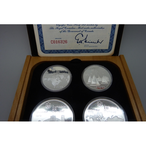 7309 - A set of Canadian Mint sterling silver proof 1976 Olympic coins, cased and with certificate