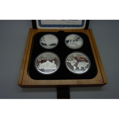 7309 - A set of Canadian Mint sterling silver proof 1976 Olympic coins, cased and with certificate