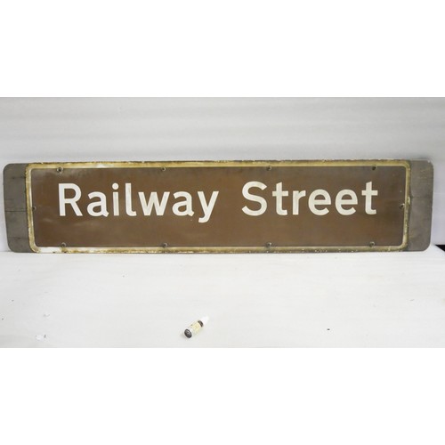 9215 - A heritage street name sign. 'Railway Street'. Measures 29.5 x 137 HxW. To be sold with no reserve.