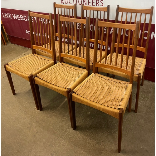 3 - A set of six Danish Mogens Kold teak and paper cord seated dining chairs, designed by Arne Hovmand-O... 