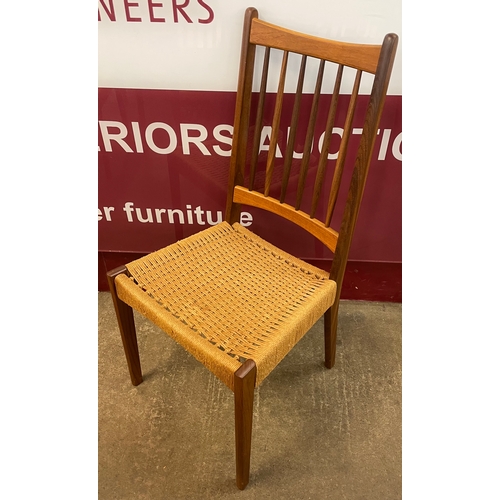 3 - A set of six Danish Mogens Kold teak and paper cord seated dining chairs, designed by Arne Hovmand-O... 