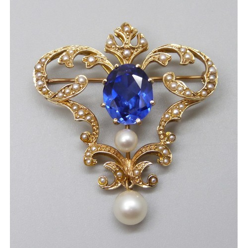 7070A - A 14ct gold 5.41ct synthetic sapphire and seed pearl brooch with pendant loop, with AnchorCert repor... 