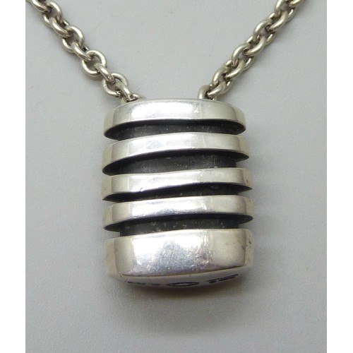 7135A - A silver Georg Jensen pendant and chain, number 203, with box and receipt dated 2008, Georg Jensen, ... 