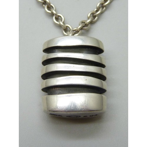 7135A - A silver Georg Jensen pendant and chain, number 203, with box and receipt dated 2008, Georg Jensen, ... 