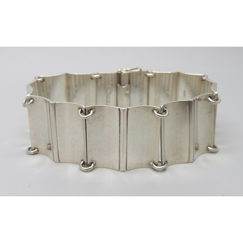 7135B - A Georg Jensen silver panel bracelet designed by Arno Malinowski, marked Georg Jensen Sterling Denma... 