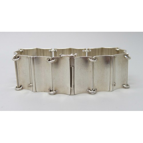 7135B - A Georg Jensen silver panel bracelet designed by Arno Malinowski, marked Georg Jensen Sterling Denma... 