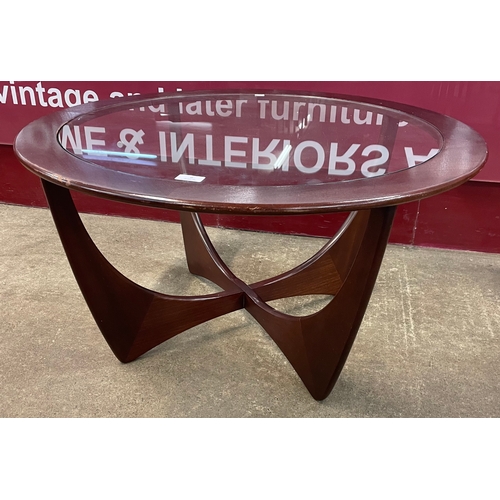 6 - A G-Plan Astro teak and glass topped circular coffee table