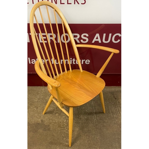 29 - An Ercol Blonde elm and beech Quaker elbow chair