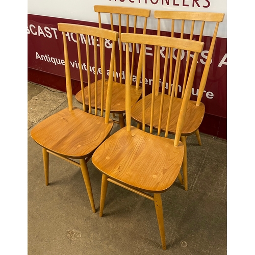 30 - A set of four Ercol Blonde elm and beech 608 model chairs