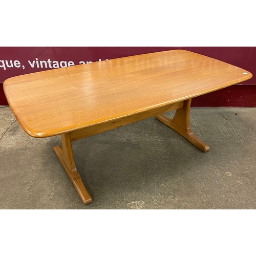 31 - An Ercol Blonde ash coffee table