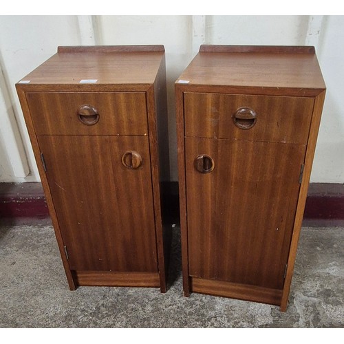 48 - A pair of teak bedside cabinets