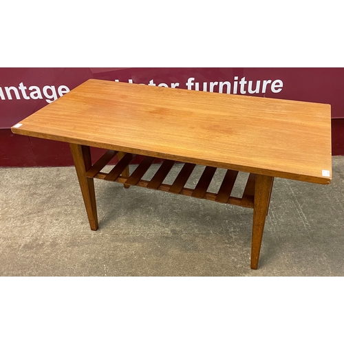 49 - A teak coffee table