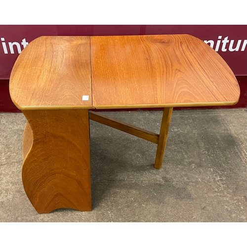 51 - A small teak drop leaf bookcase