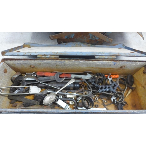 5006 - A cantilever toolbox with an assortment of tools including sockets, wrenches, adjustable wrenches, v... 