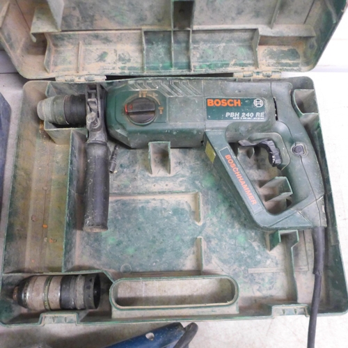 5018 - Four tools - A Makita BJV180 18v jigsaw, a Bosch GWS 20-230H 110v angle grinder, a Bosch GBH 3-28 DF... 