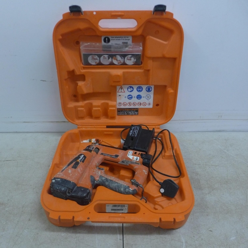 5028 - A Paslode Impulse IM65 F16 LI cordless nail gun with battery and charger - in case and 2 x 15ml bott... 