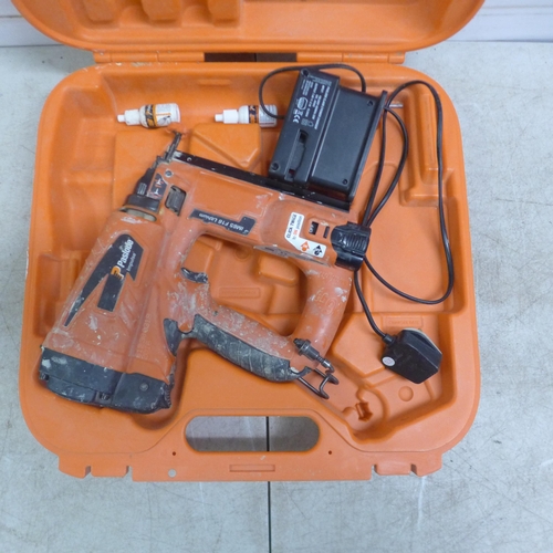 5028 - A Paslode Impulse IM65 F16 LI cordless nail gun with battery and charger - in case and 2 x 15ml bott... 