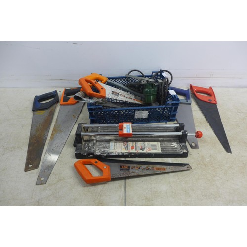 5014 - 7 Assorted hand saws, a Plasplugs tile cutter and a hack saw frame