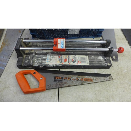 5014 - 7 Assorted hand saws, a Plasplugs tile cutter and a hack saw frame