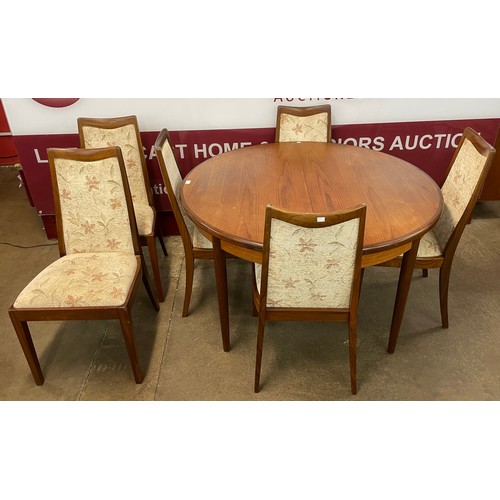 55 - A G-Plan Fresco teak circular extending dining table and six chairs