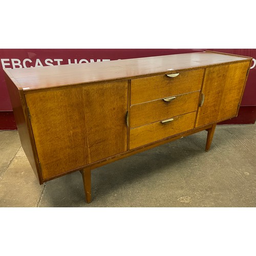 69 - A teak sideboard