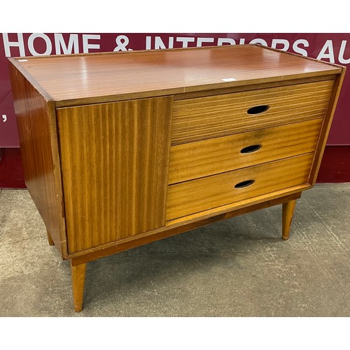 72 - A small Austin Suite teak and tola wood sideboard