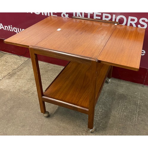 73 - A teak drop leaf cocktail trolley