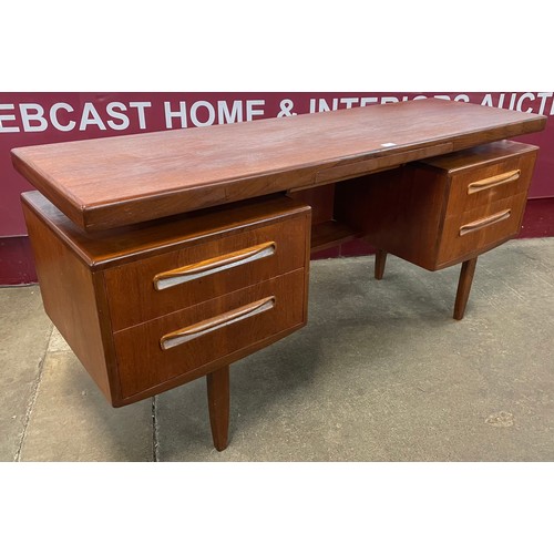 82 - A G-Plan Fresco teak floating top desk