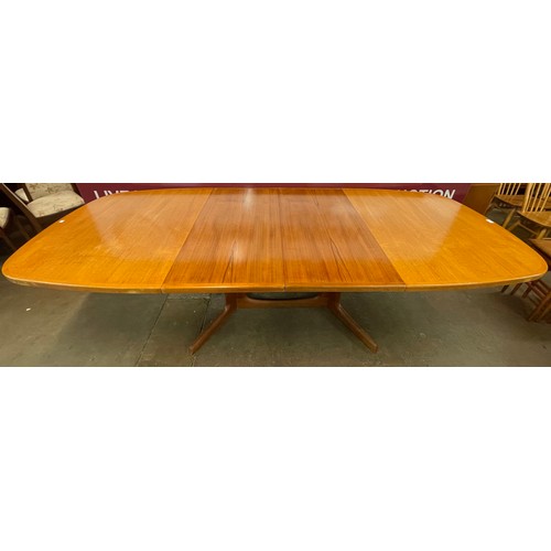 90 - A Danish teak extending dining table