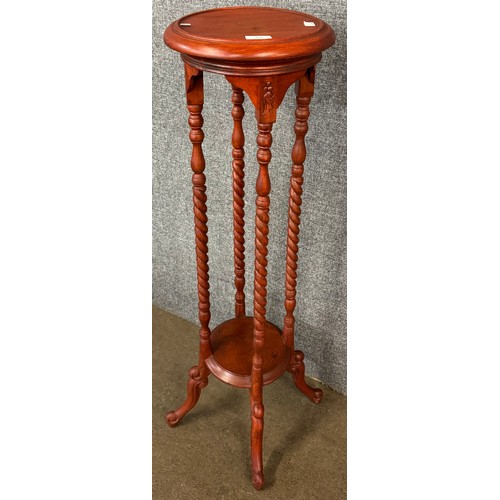 152 - A mahogany barleytwist jardiniere stand