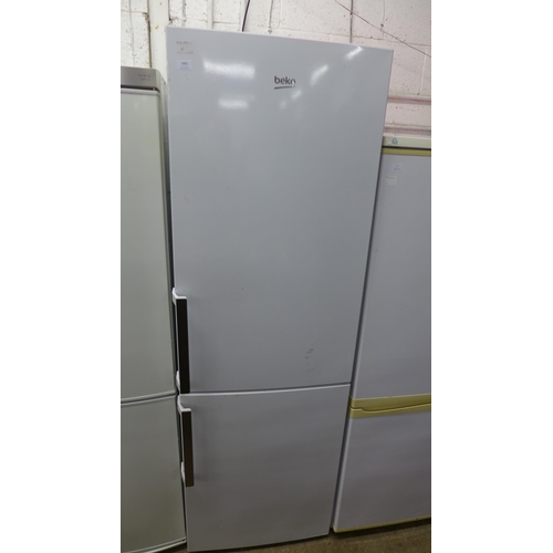 5082 - A Beko free standing 60/40 tower fridge freezer