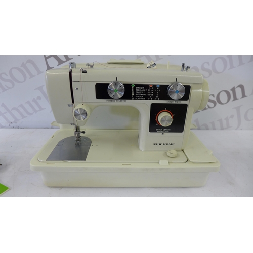 5182 - A NewHome model 632 electric sewing machine with pedal - in a hard case