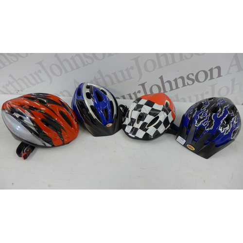 5209 - Four cycling safety helmets