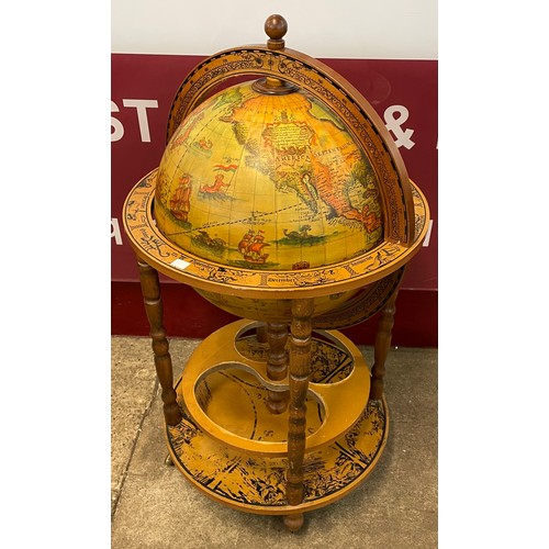 104 - An Italian style terrestrial globe cocktail cabinet/trolley