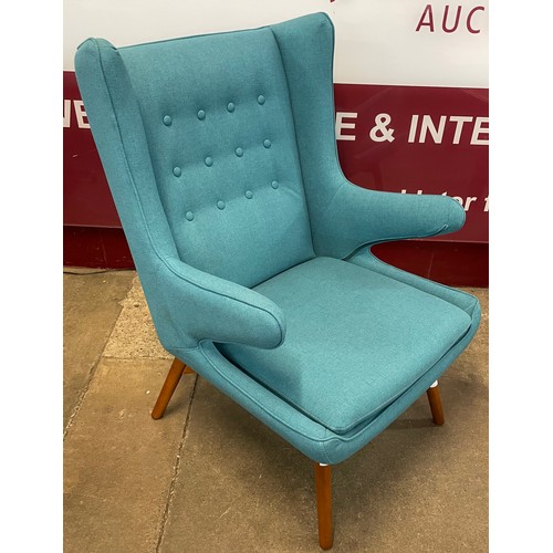 108 - A Danish style ash and blue fabric upholstered armchair