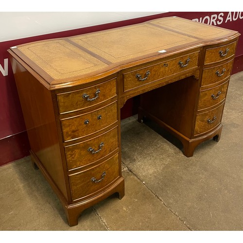 115 - A Bevan Funnell burr walnut, oak and leather topped desk