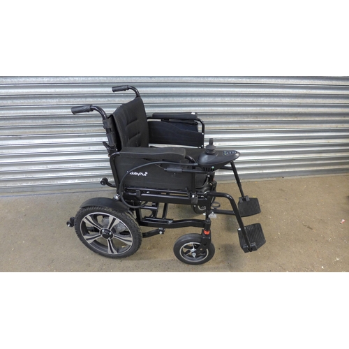 5069 - A Mobility Plus electric mobility wheelchair with battery charger and footrests