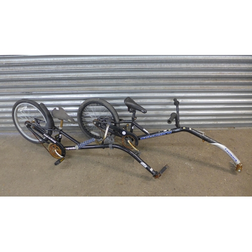 5097 - Two Tag-A-long bike attachments