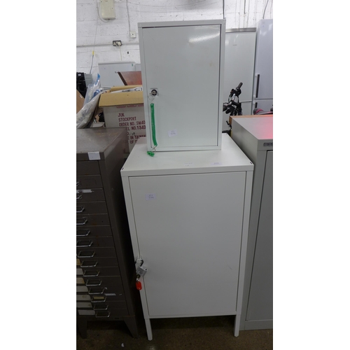 5112 - A lockable floor standing cabinet and a lockable wall cabinet both with a key