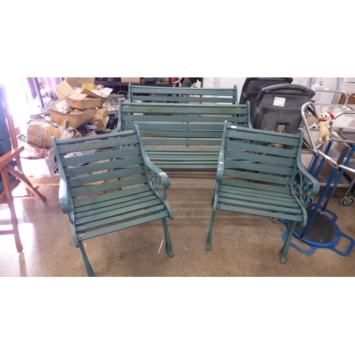 5118 - 2 green painted wooden garden benches with cast iron bench ends and 2 matching green painted wooden ... 