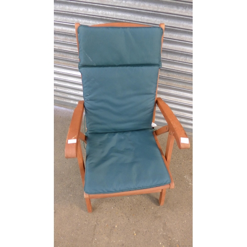 5119 - A teak folding garden chair with padded seat cover