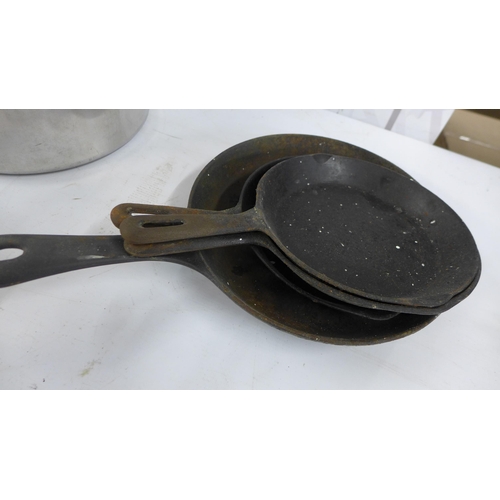 5242 - A quantity of catering equipment including pans, trays, mincers, skillets, fondue set, etc